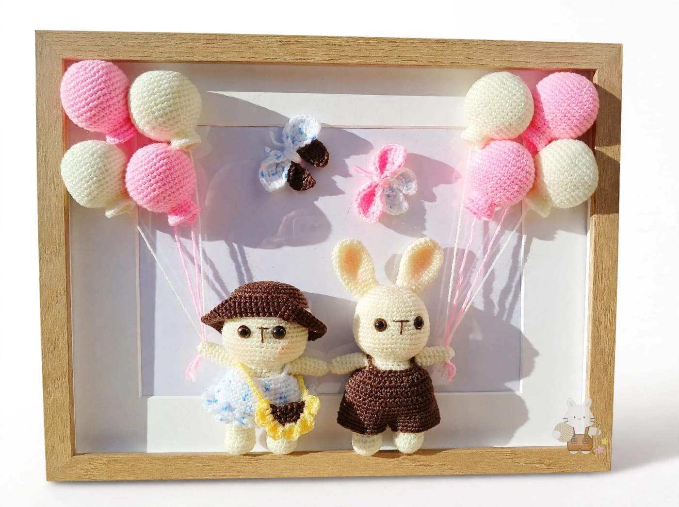 Couple de lapins aux ballons